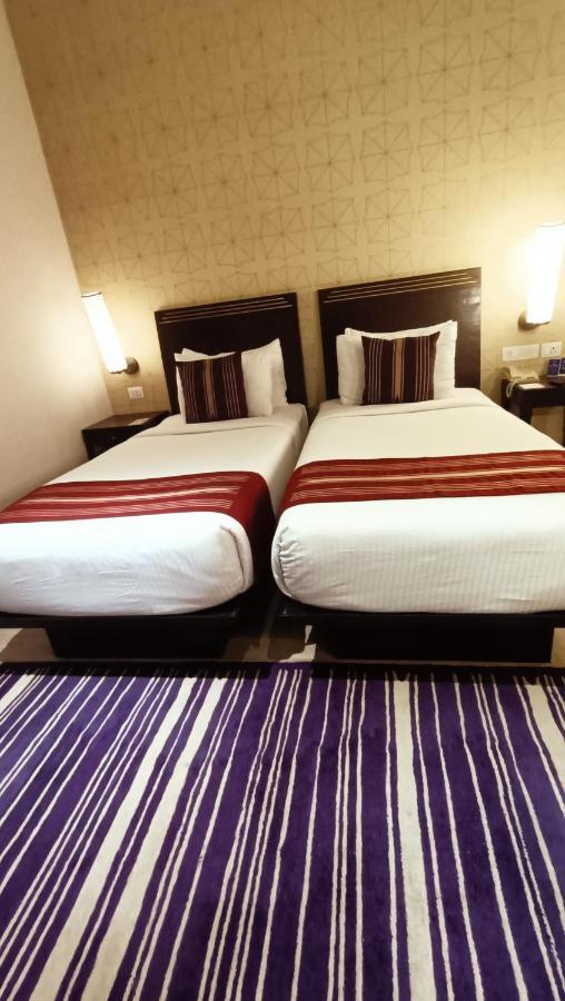 Marasa Sarovar Premiere Tirupati Dış mekan fotoğraf A room at the hotel