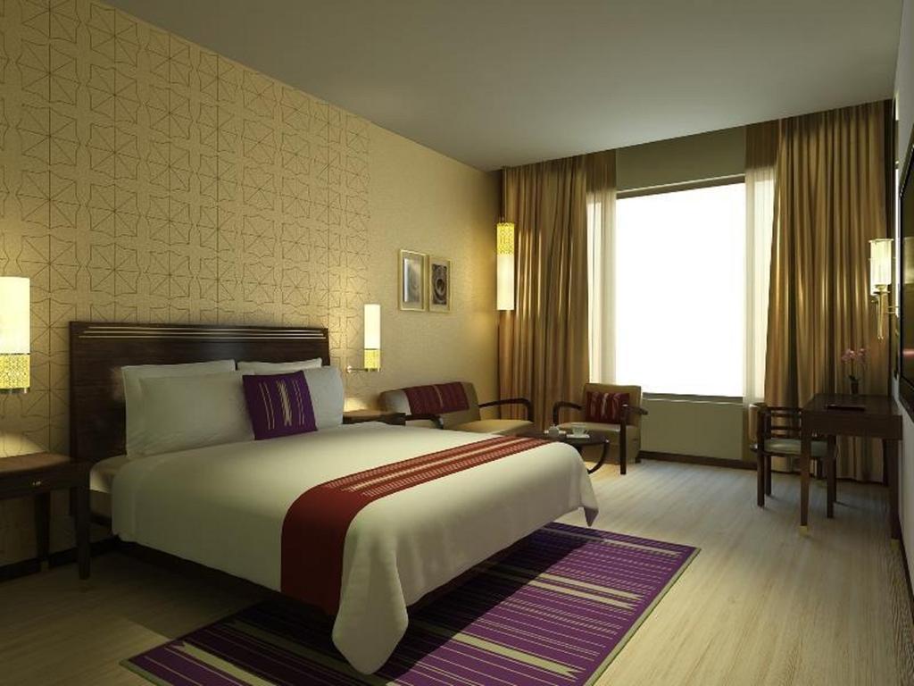 Marasa Sarovar Premiere Tirupati Dış mekan fotoğraf A typical room at the hotel